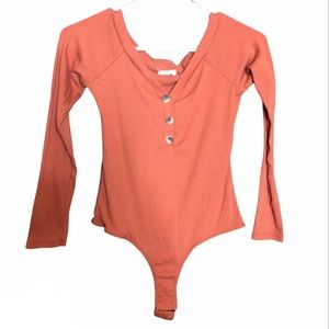 Medium orange bodysuit